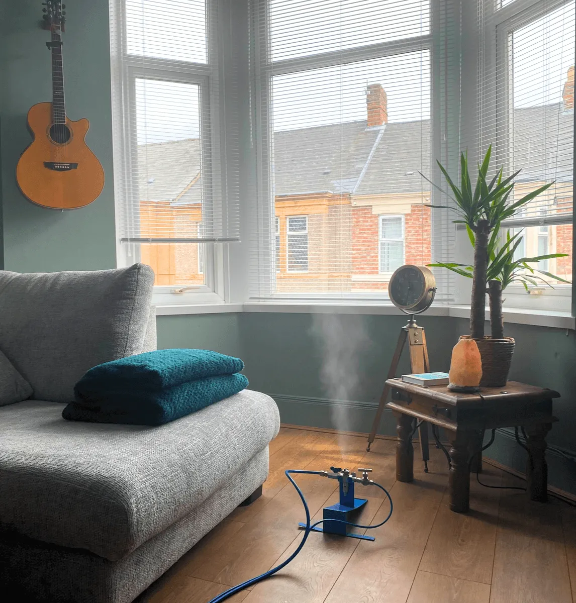 VaPURE&trade; vapor treatment sanitizing a living room