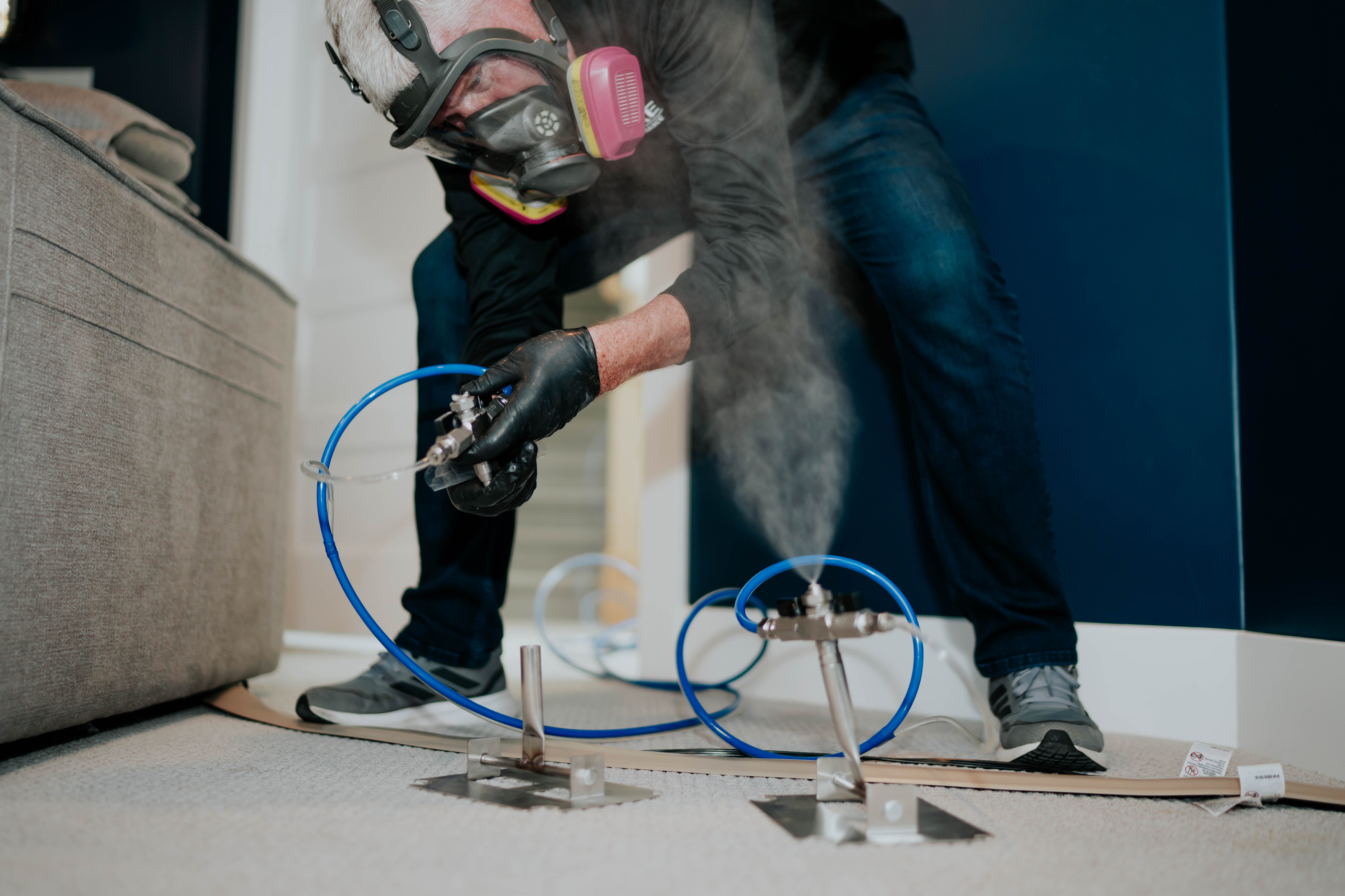 Technician applying patented VaPURE dry fog during a mold remediation
